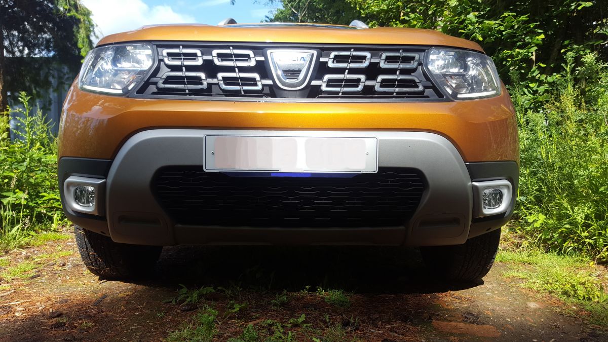 Duster II fog light trim both fitted