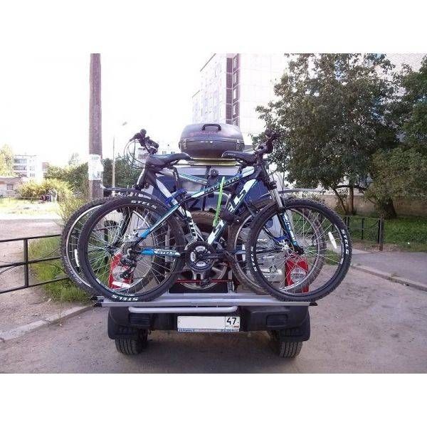 Suport biciclete Menabo Boa 3 pentru 3 biciclete cu prindere pe roata de rezerva