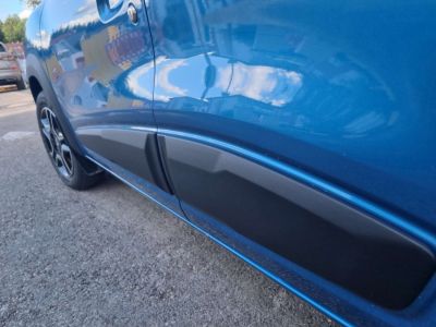 Dacia Spring - Set protectii laterale portiere (Dacia Original)